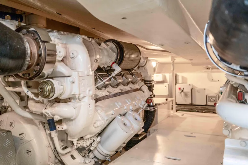 Vimojal II Yacht Photos Pics Engine room of a 2009 Riva 52' le yacht, showcasing mechanical components and systems.