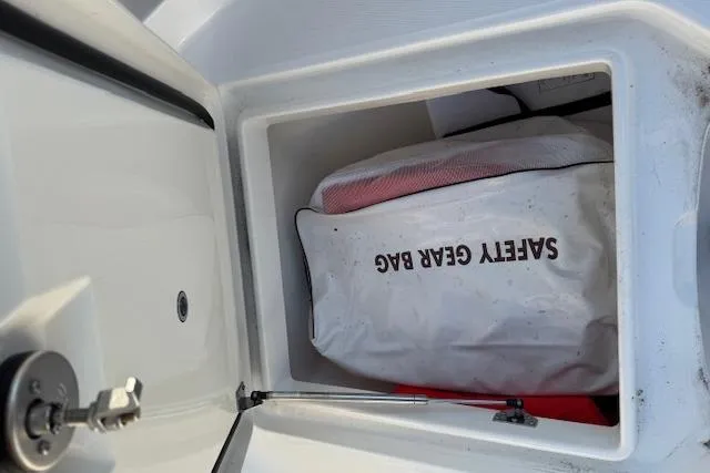  Yacht Photos Pics 2023 Regulator 31 boat storage compartment with safety gear bag inside.