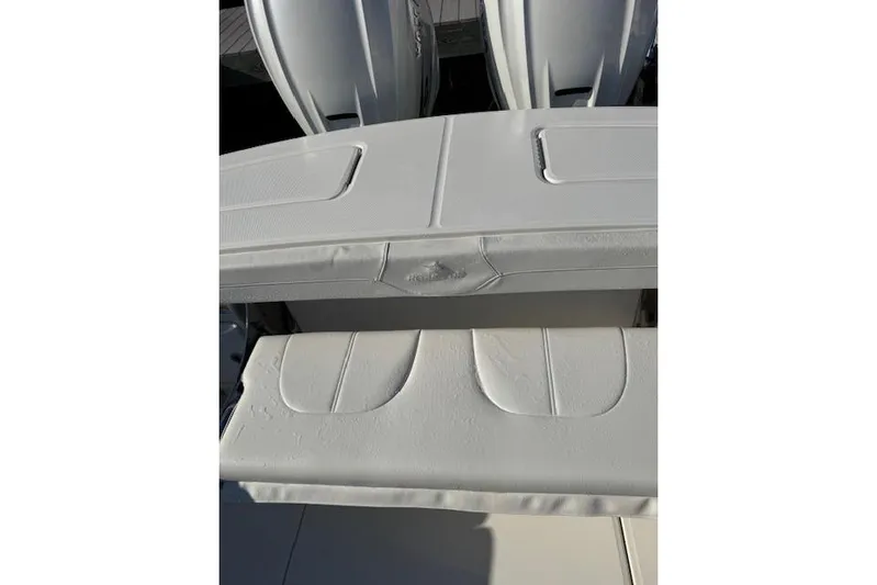  Yacht Photos Pics 2023 Regulator 31 boat with white seating and dual engines.