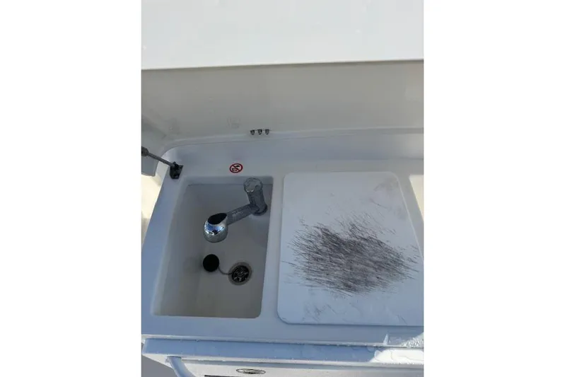  Yacht Photos Pics 2023 Regulator 31 boat sink and cutting board setup.