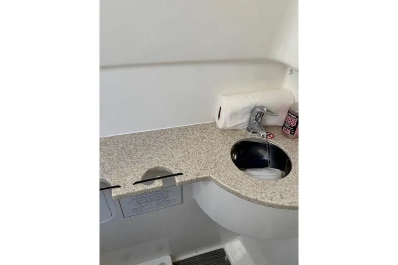 Yacht Photos Pics 2023 Regulator 31 boat interior with sink and countertop.