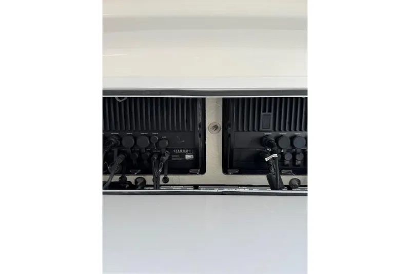  Yacht Photos Pics 2023 Regulator 31 boat electronics panel with wiring and controls.