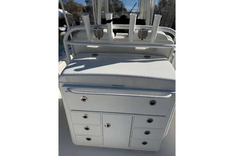  Yacht Photos Pics 2023 Regulator 31 boat console with storage drawers and rod holders.