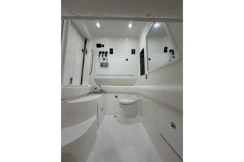  Yacht Photos Pics 2025 Deep Impact 369 Sport boat bathroom with modern fixtures and sleek design.