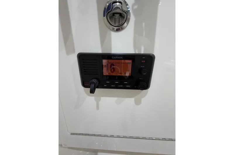  Yacht Photos Pics Garmin marine radio on 2025 Deep Impact 369 Sport boat dashboard.