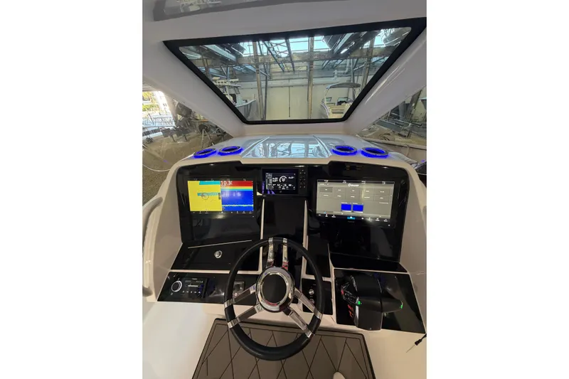  Yacht Photos Pics Cockpit of 2025 Deep Impact 369 Sport boat with advanced navigation displays.