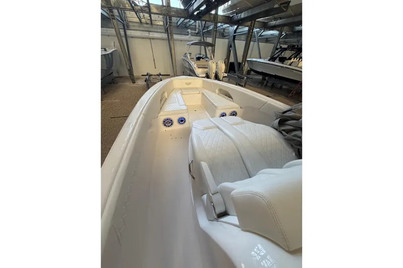  Yacht Photos Pics 2025 Deep Impact 369 Sport boat interior with white seating and modern design.
