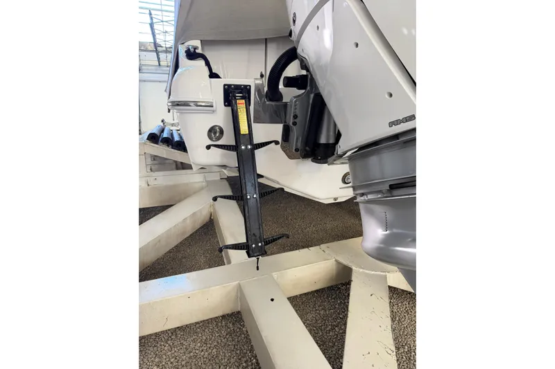  Yacht Photos Pics 2025 Deep Impact 369 Sport boat engine detail on display stand.