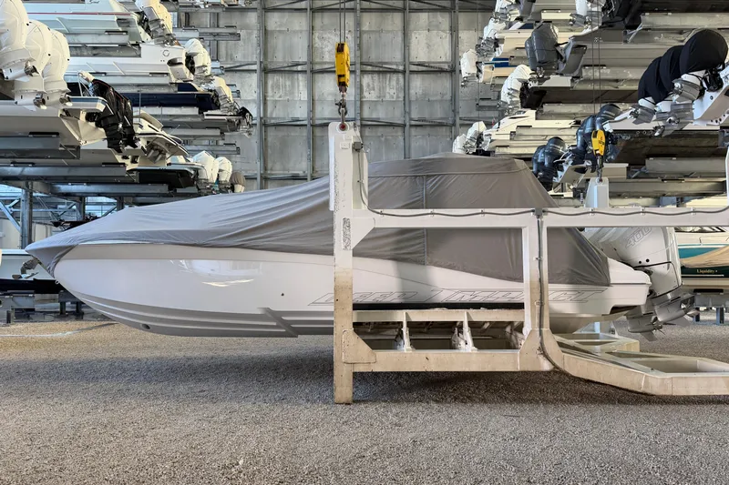  Yacht Photos Pics Covered 2025 Deep Impact 369 Sport boat in storage facility.