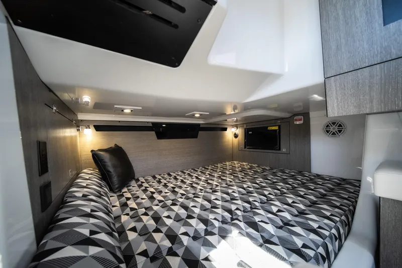 Yacht Photos Pics Interior cabin of 2026 Monterey 378SS Super Sport with geometric-patterned bedding.