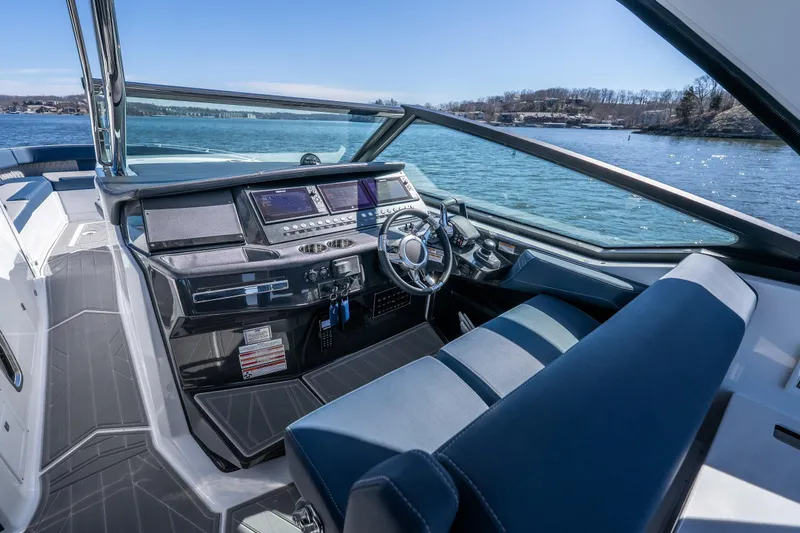  Yacht Photos Pics 2026 Monterey 378SS Super Sport boat interior with modern dashboard and steering wheel.