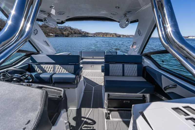  Yacht Photos Pics Luxurious interior of 2026 Monterey 378SS Super Sport boat on a serene lake.