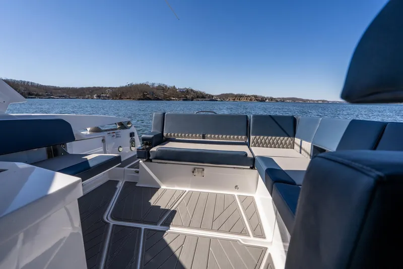  Yacht Photos Pics Luxurious seating on 2026 Monterey 378SS Super Sport boat with scenic lake view.