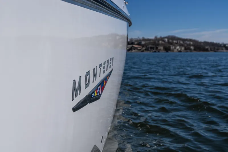  Yacht Photos Pics 2026 Monterey 378SS Super Sport boat on water, showcasing sleek design and branding.