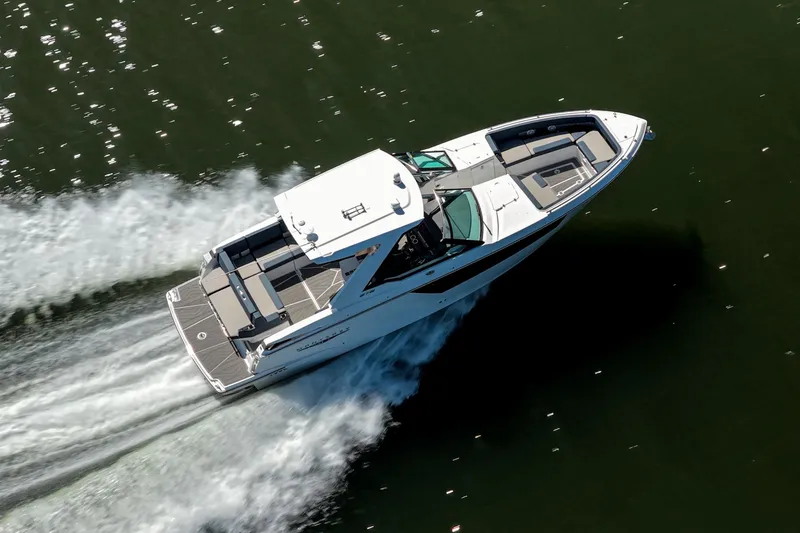  Yacht Photos Pics Aerial view of 2026 Monterey 378SS Super Sport boat cruising on water.