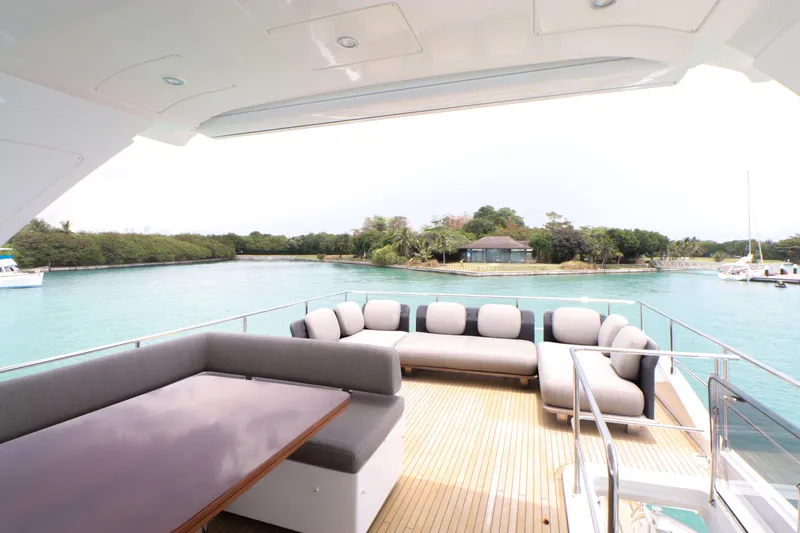  Yacht Photos Pics Luxurious Azimut 66 yacht deck overlooking tropical island, 2019 model.