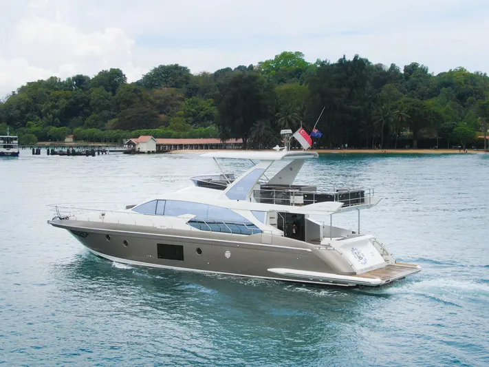  Yacht Photos Pics 2019 Azimut 66 luxury yacht cruising on calm waters.