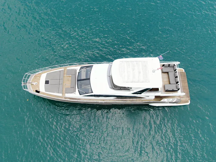  Yacht Photos Pics Aerial view of a 2019 Azimut 66 yacht on blue water.