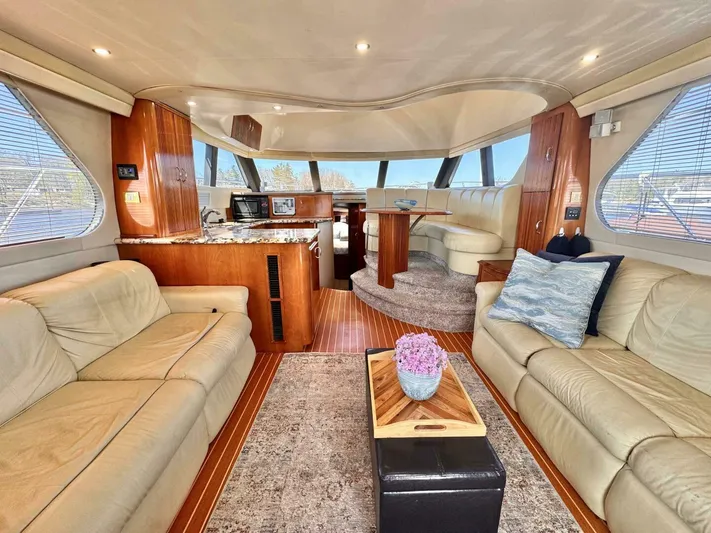  Yacht Photos Pics Luxurious interior of a 2004 Carver 460 Voyager yacht with elegant seating and modern amenities.