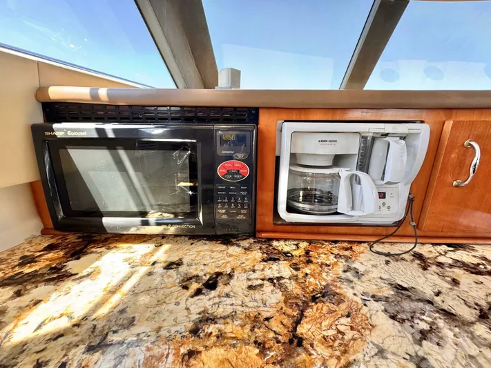  Yacht Photos Pics Microwave and coffee maker on Carver 460 Voyager yacht's granite countertop, 2004 model.