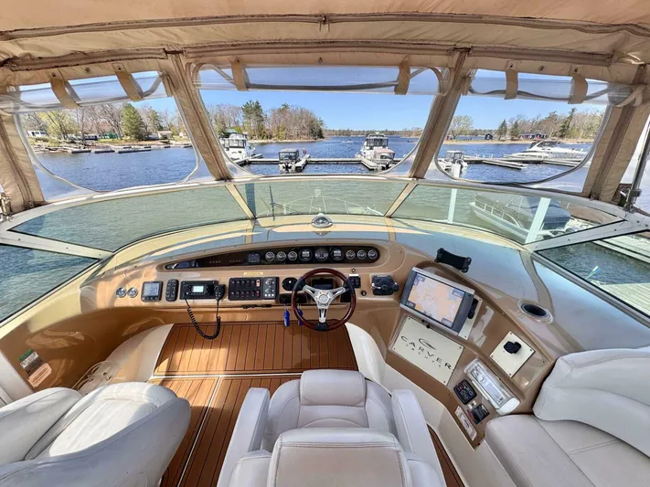 Yacht Photos Pics Interior view of 2004 Carver 460 Voyager yacht cockpit with navigation equipment.