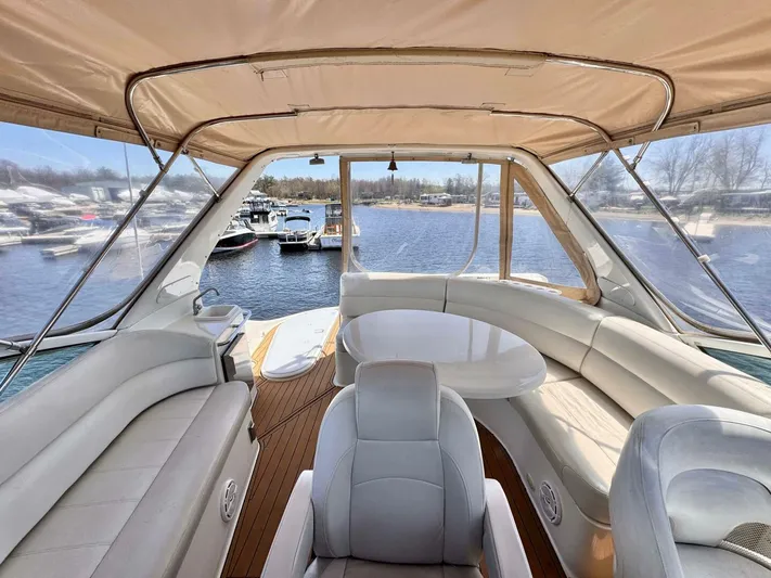  Yacht Photos Pics 2004 Carver 460 Voyager yacht interior with spacious seating and panoramic windows.