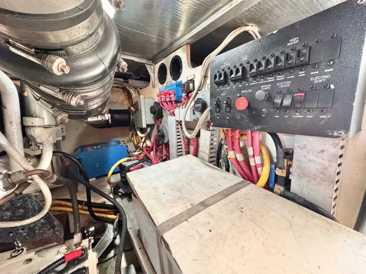  Yacht Photos Pics Engine room of 2004 Carver 460 Voyager with control panel and wiring.