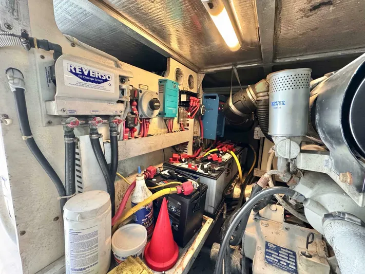  Yacht Photos Pics Engine room of a 2004 Carver 460 Voyager with various equipment and wiring.