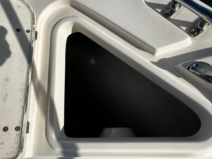  Yacht Photos Pics Grady-White Express 330 storage compartment, 2021 model, open hatch view.