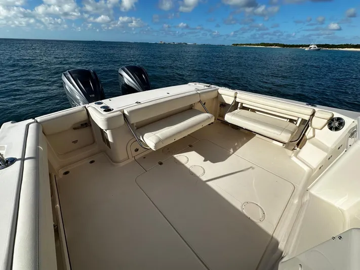  Yacht Photos Pics 2021 Grady-White Express 330 boat deck with dual engines, ocean view.