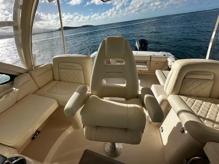  Yacht Photos Pics Luxurious interior of 2021 Grady-White Express 330 boat with ocean view.