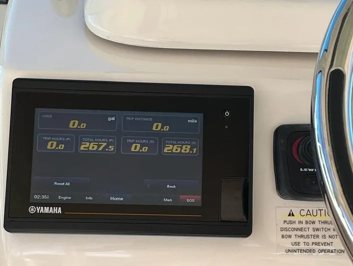  Yacht Photos Pics Yamaha display on 2021 Grady-White Express 330 boat dashboard, showing trip and engine data.