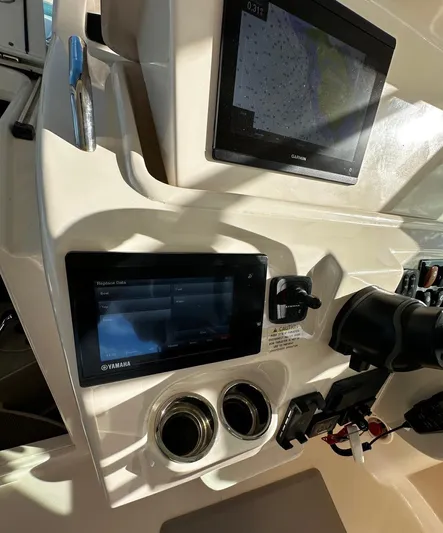  Yacht Photos Pics 2021 Grady-White Express 330 dashboard with navigation screens and controls.