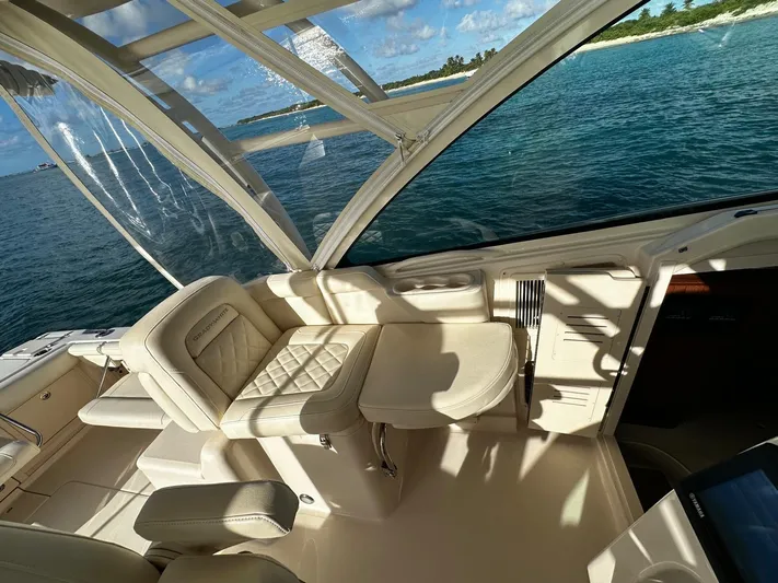  Yacht Photos Pics Interior of 2021 Grady-White Express 330 boat with seating and ocean view.