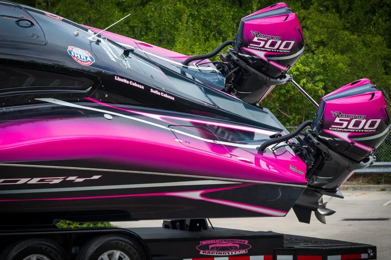  Yacht Photos Pics 2023 MTI 390XR powerboat with vibrant pink design and dual Racing 500 engines.