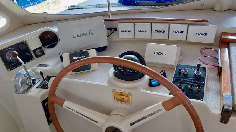 Forever Young Yacht Photos Pics Cockpit of 2000 Amel Super Maramu with Garmin and B&G navigation equipment.