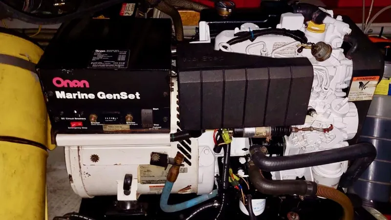 Forever Young Yacht Photos Pics Onan Marine GenSet engine in Amel Super Maramu 2000 yacht.