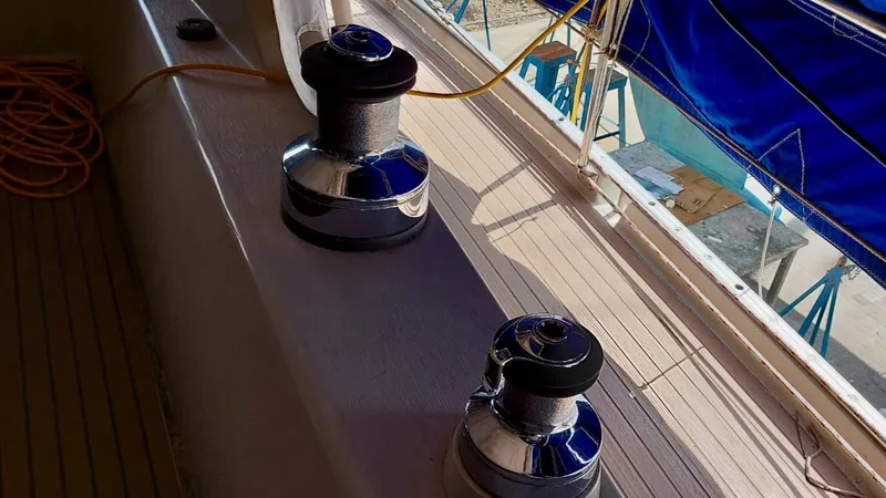 Forever Young Yacht Photos Pics Winches on Amel Super Maramu 2000 yacht deck, showcasing sailing equipment.