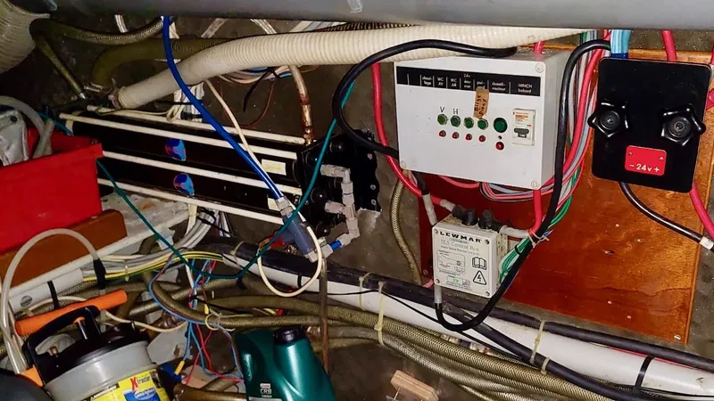 Forever Young Yacht Photos Pics Electrical panel and wiring inside a 2000 Amel Super Maramu yacht.