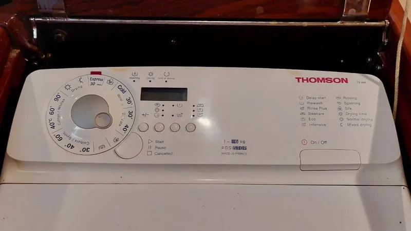 Forever Young Yacht Photos Pics Control panel of a Thomson washing machine on an Amel Super Maramu 2000 yacht.