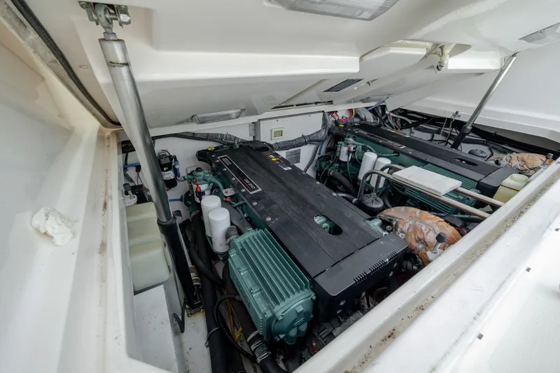 Knot On Call Yacht Photos Pics Engine compartment of a 2004 Tiara Yachts 3200 Open, showcasing dual engines.
