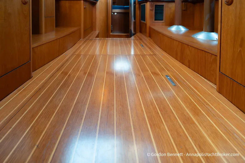Margaritaville Yacht Photos Pics Interior view of 2004 Jeanneau Sun Odyssey 43 DS with polished wooden flooring.
