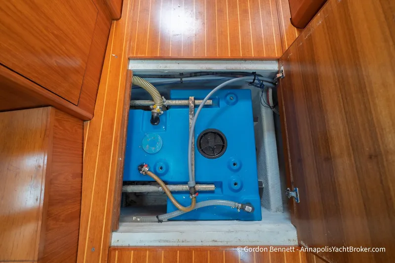Margaritaville Yacht Photos Pics Blue water tank in 2004 Jeanneau Sun Odyssey 43 DS yacht interior compartment.