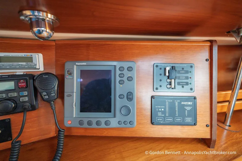 Margaritaville Yacht Photos Pics Control panel of 2004 Jeanneau Sun Odyssey 43 DS yacht with navigation and communication equipment.