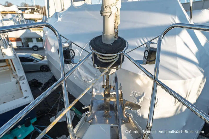 Margaritaville Yacht Photos Pics Bow view of 2004 Jeanneau Sun Odyssey 43 DS yacht in a marina.