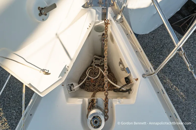 Margaritaville Yacht Photos Pics Anchor locker of 2004 Jeanneau Sun Odyssey 43 DS sailboat with chain and rope.