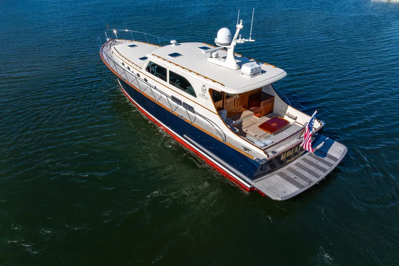 Holly Ann Yacht Photos Pics 2010 Vicem 64 Classic yacht cruising on open water, rear view.