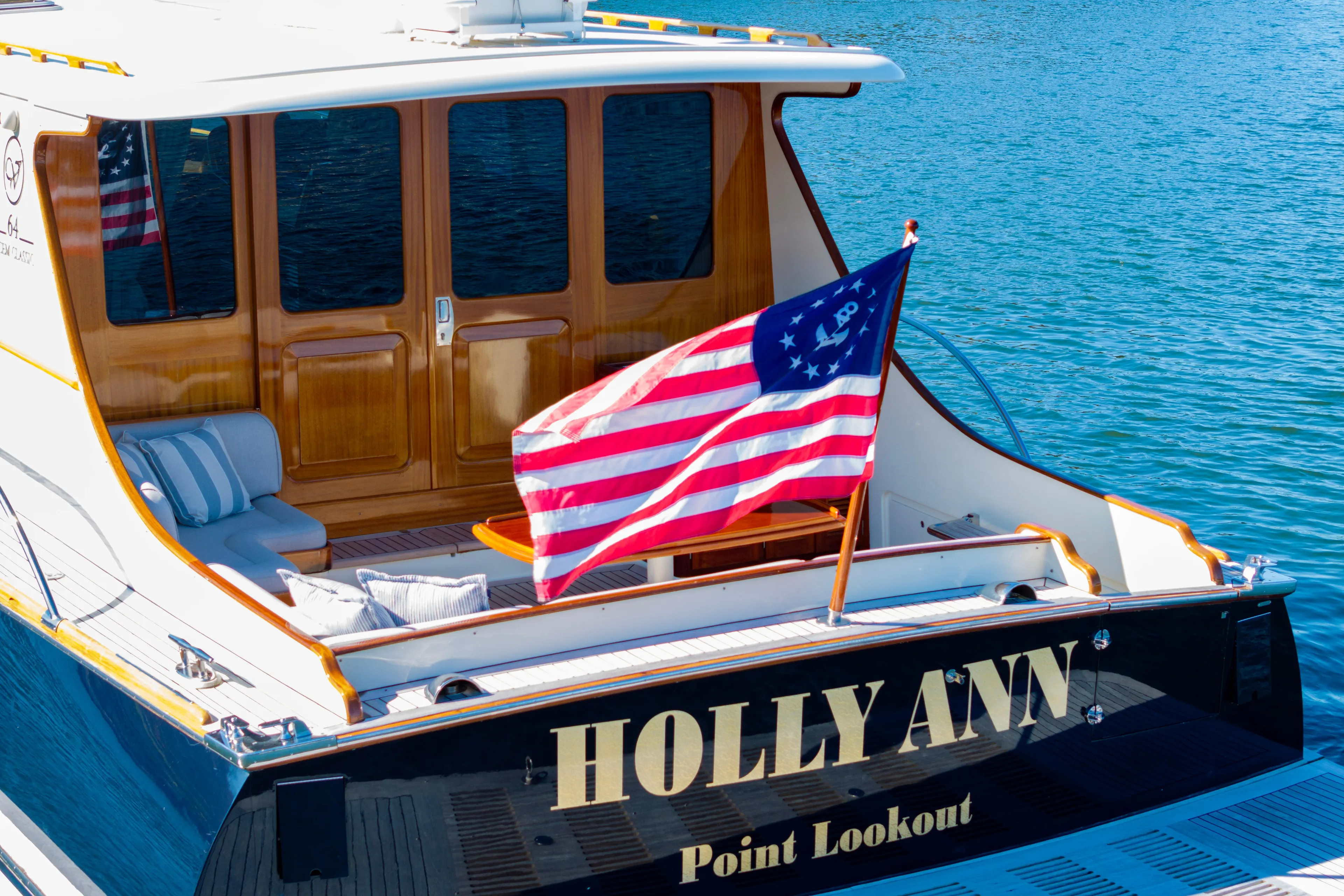 Holly Ann Yacht Photos Pics 2010 Vicem 64 Classic yacht "Holly Ann" with American flag, docked at Point Lookout.