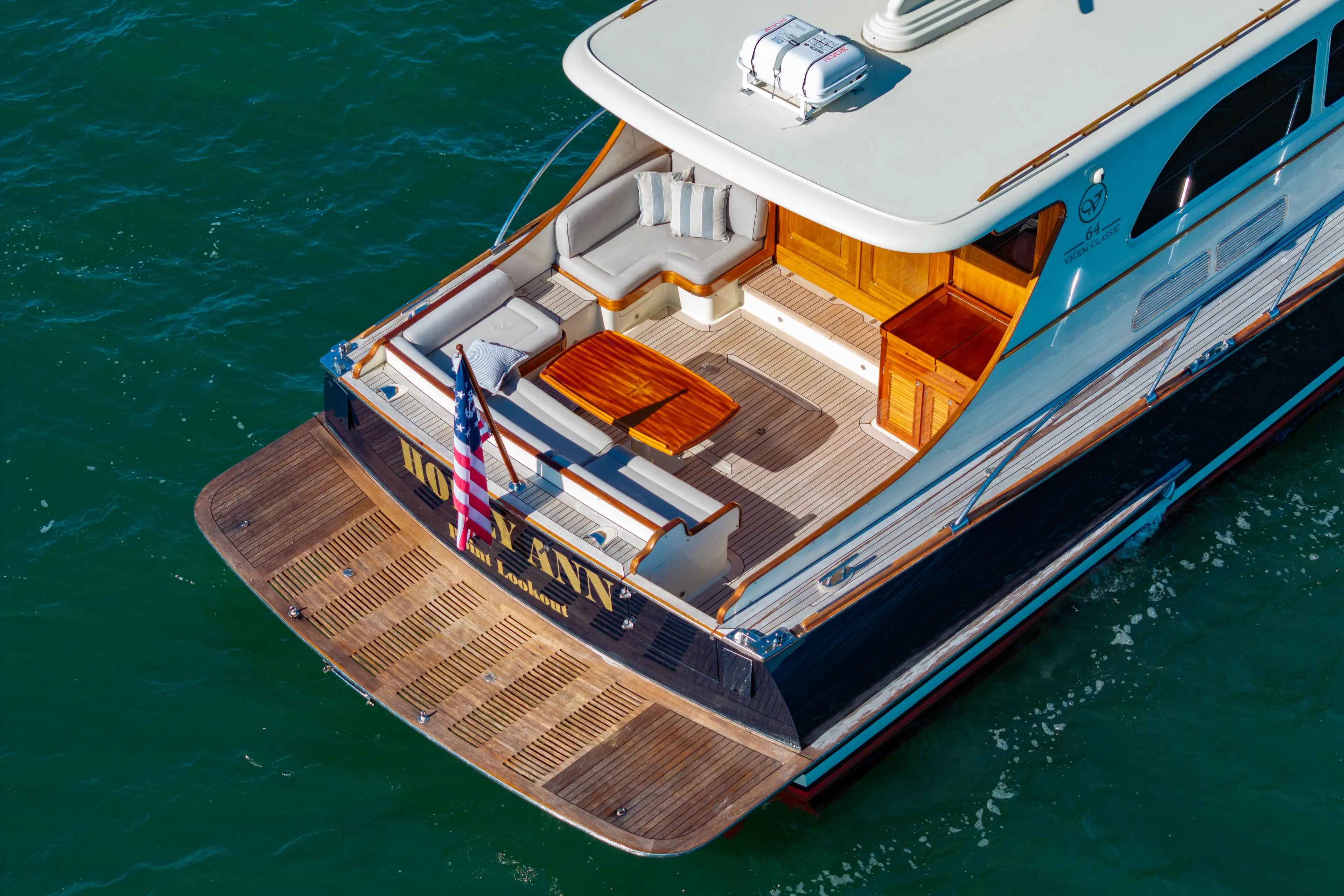 Holly Ann Yacht Photos Pics 2010 Vicem 64 Classic yacht with elegant deck and seating area on the water.