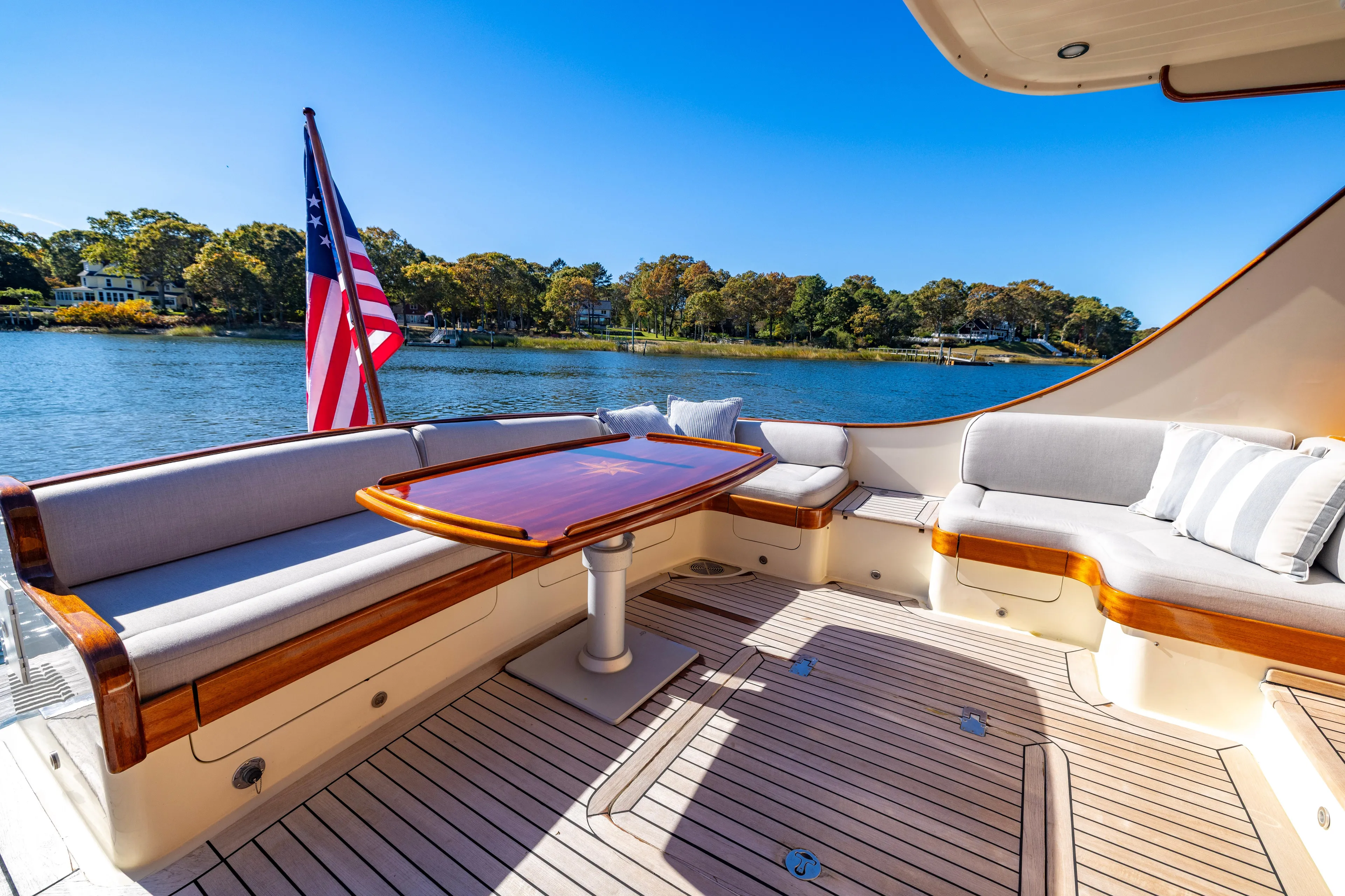 Holly Ann Yacht Photos Pics Luxurious 2010 Vicem 64 Classic yacht deck with elegant seating and scenic water view.